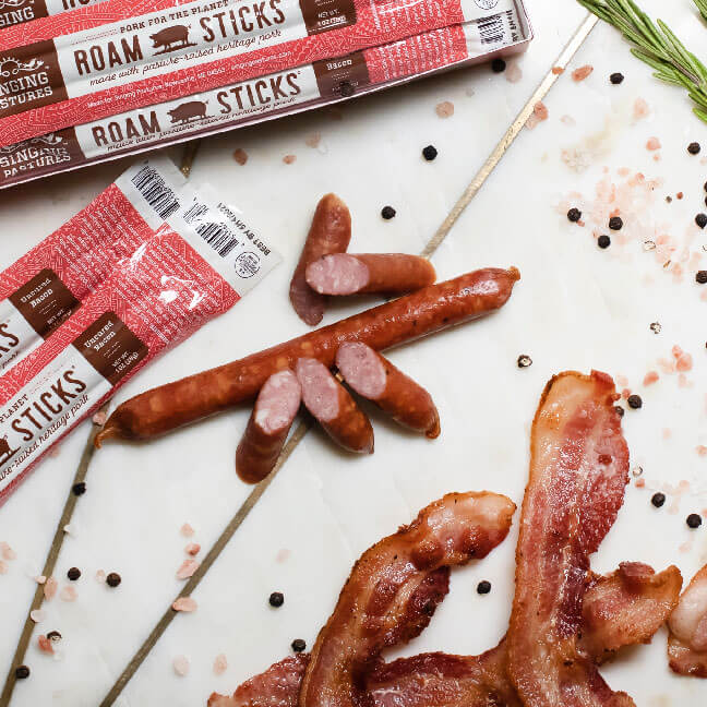 Singing Pastures Uncured Bacon Roam Sticks with strips of bacon